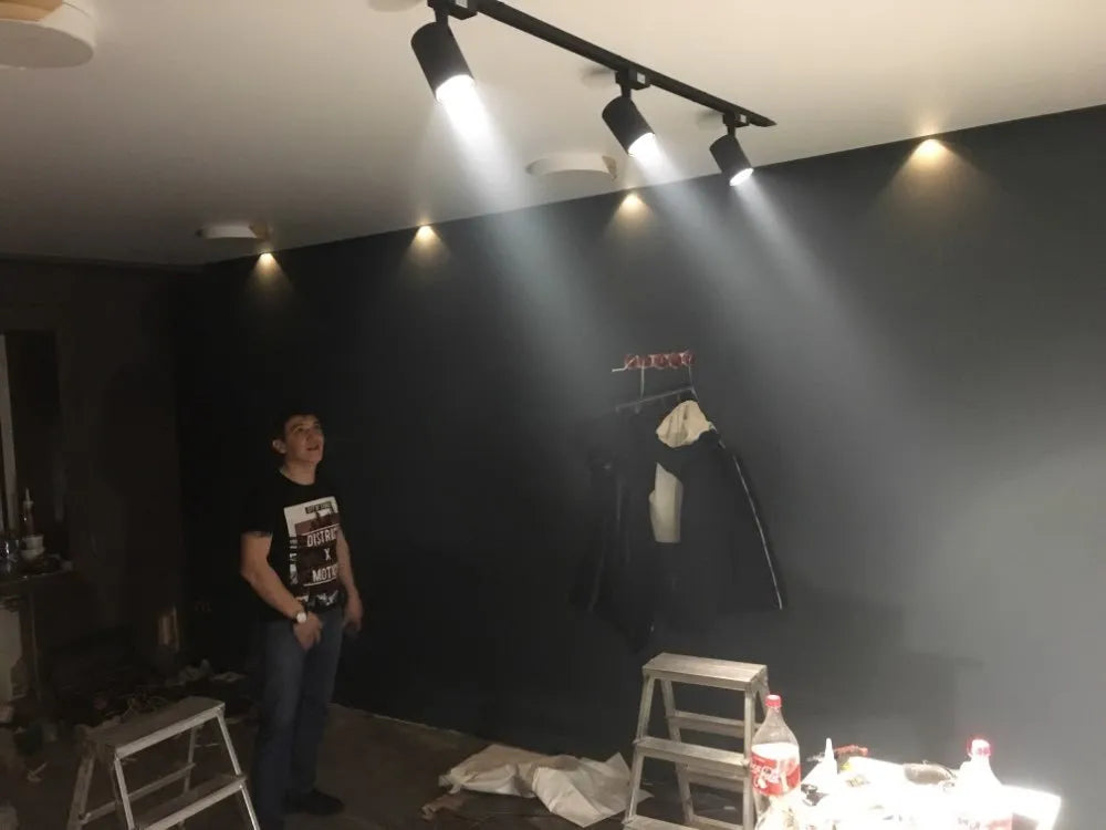 Black LED track spotlight with narrow beam angle for jewellery display lighting