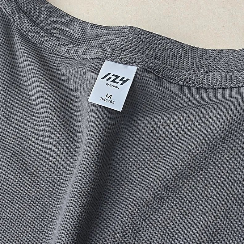 Men's waffle-textured heavy short-sleeved T-shirt in a solid colour, showing detail of fabric texture.