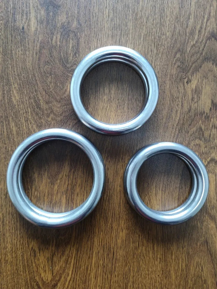 Electroplated carbon steel Wing Chun training ring for forearm strength, shown in three sizes.