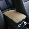 PU leather automotive armrest box cushion measuring 32x19cm in black with red cord detailing