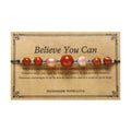 Handmade red crystal bracelet with sunstone, redstone and copper beads in a geometric design.