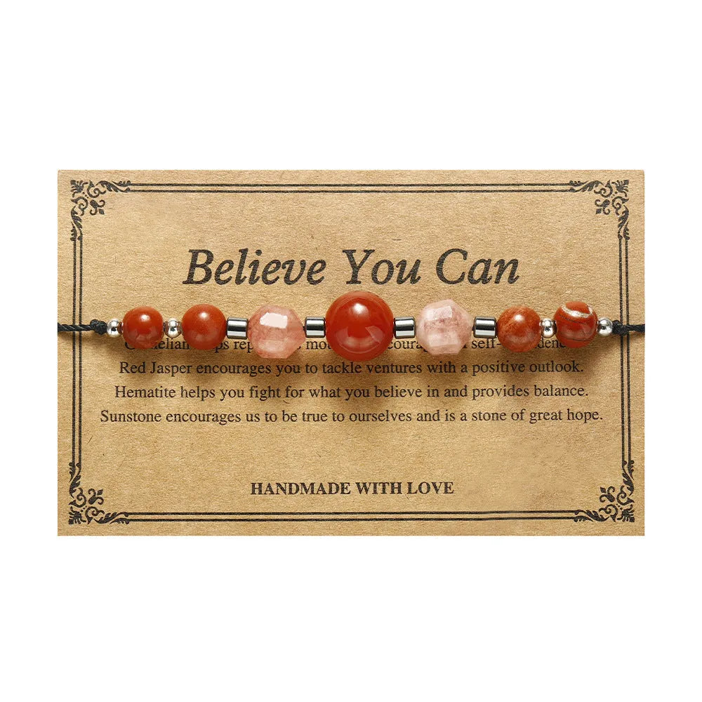 Handmade red crystal bracelet with sunstone, redstone and copper beads in a geometric design.