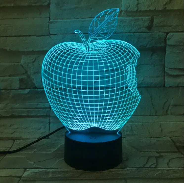 A colourful 3D fruit-shaped LED night light with a touch control panel.