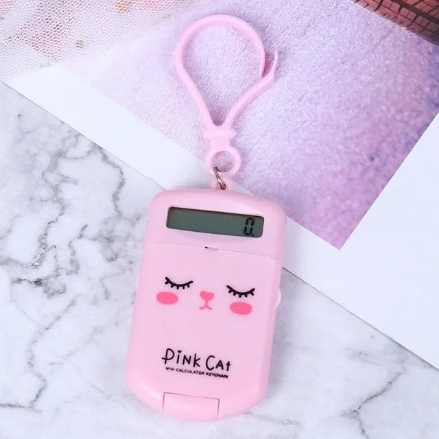Creative cookie-shaped cute mini calculator with key ring in pink, blue, grey, and black colours