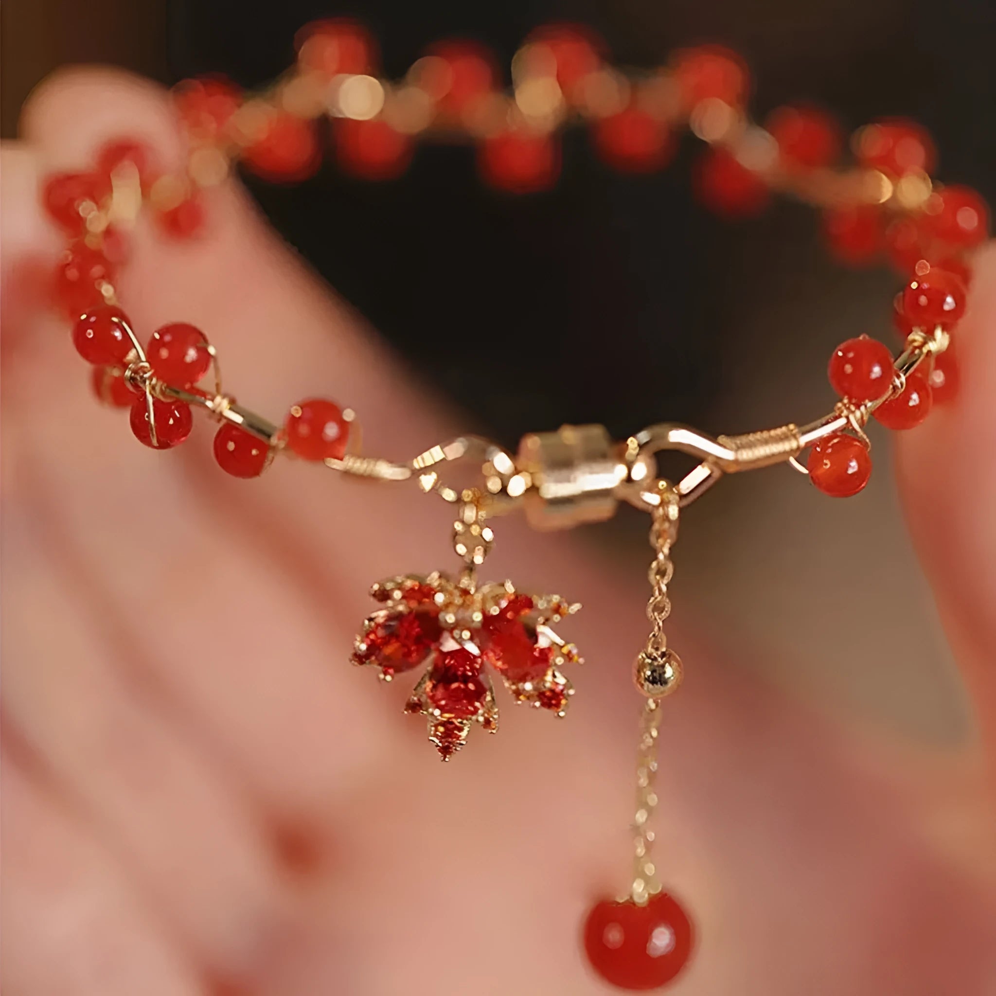 Red ginkgo leaf magnetic bracelet with electroplated alloy finish and adjustable clasp