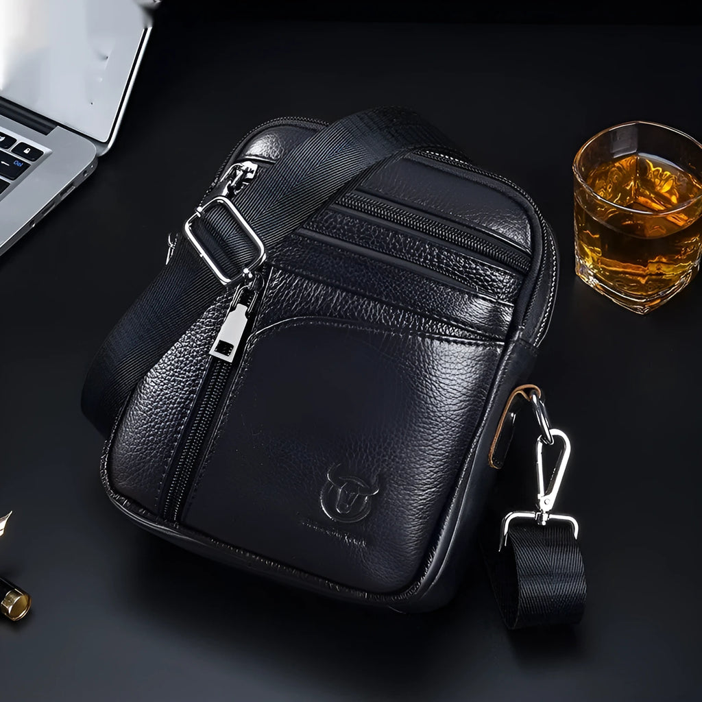Men's black genuine leather shoulder messenger bag with solid colour finish and retro European American style for leisure travel