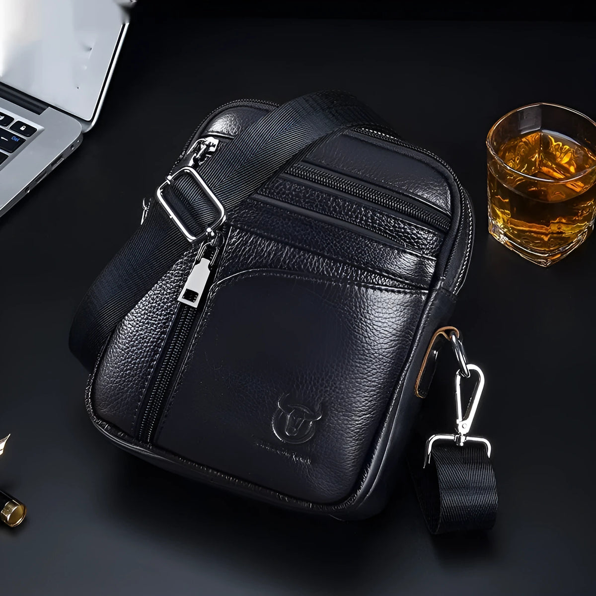 Men's black genuine leather shoulder messenger bag with solid colour finish and retro European American style for leisure travel