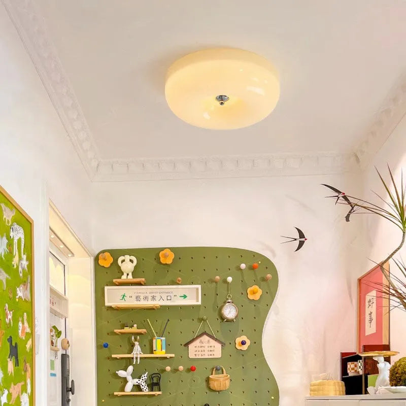 Cream coloured American style bedroom ceiling light with a three-colour light function.