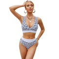 Leopard print women's swimsuit with V-neck design and cross banded bikini style