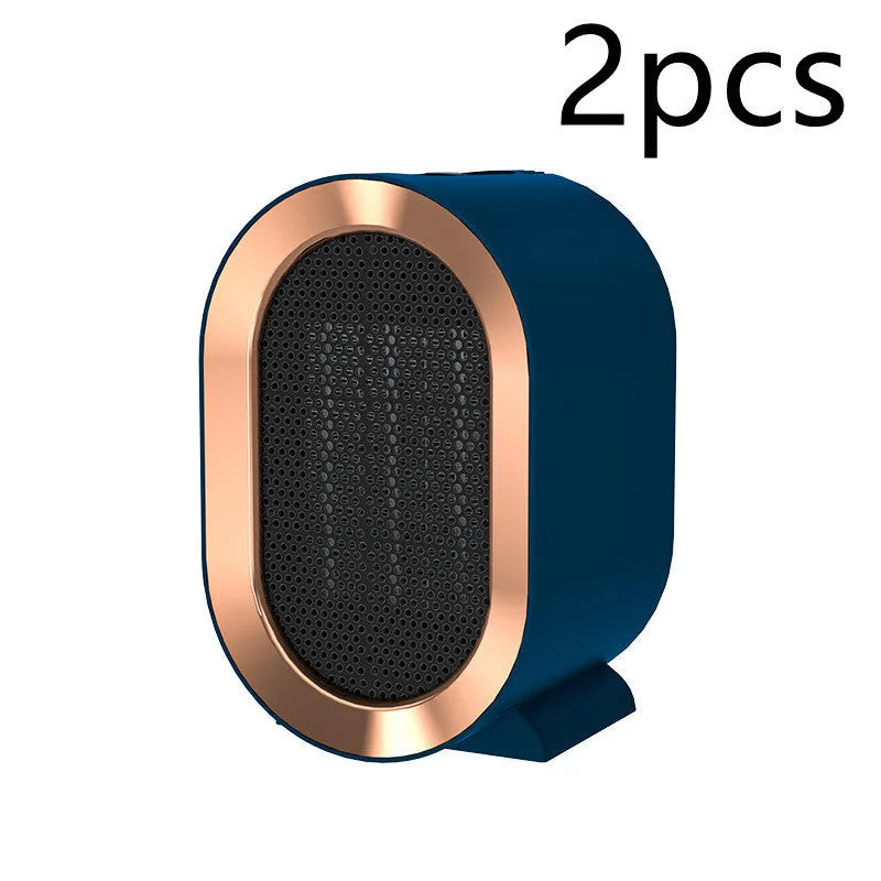Black desktop electric heater with ceramic heating element and mechanical controls