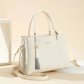 Women's square shoulder bag in PU leather with ethnic detailing and slit pocket