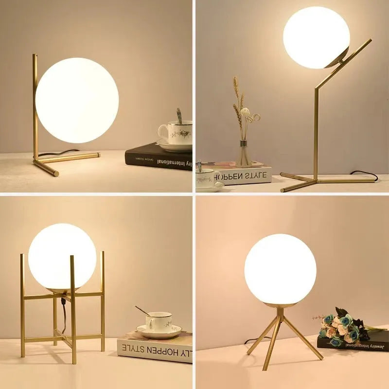 Creative desk lamp with glass shade and three-tone LED light on a desk, showing push button switch and cable.