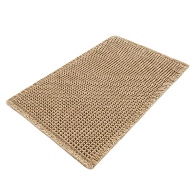 Checkered pattern non-slip absorbent bathroom floor carpet in beige colour.