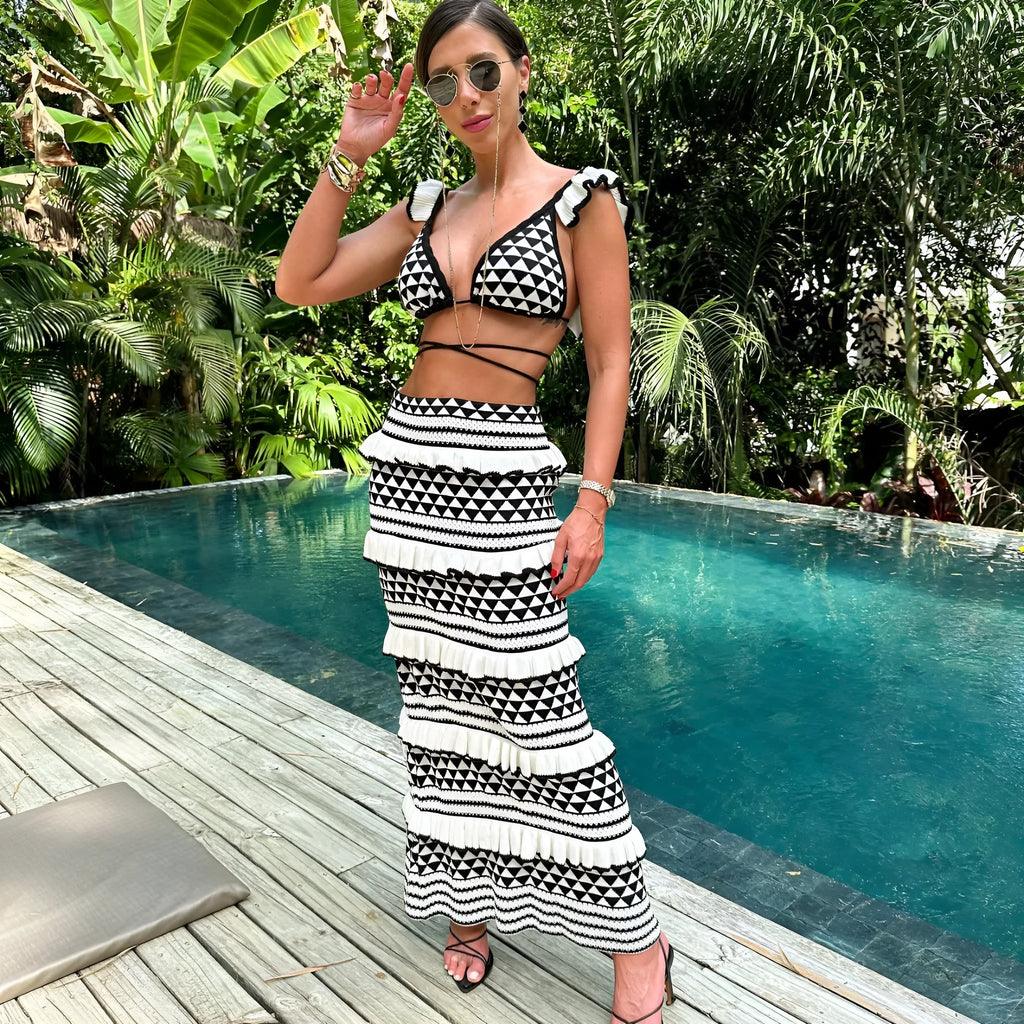 Black and white striped women's bikini set with ruffled straps and long knitted skirt