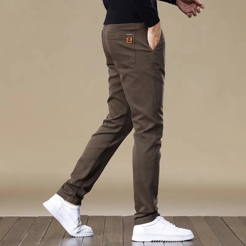 Men's fleece-lined slim fit tapered casual pants in black cotton fabric with straight leg