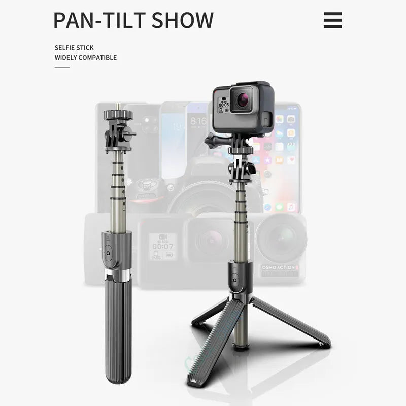 Black aluminium phone tripod selfie stick fully extended to 700mm next to an iPhone.