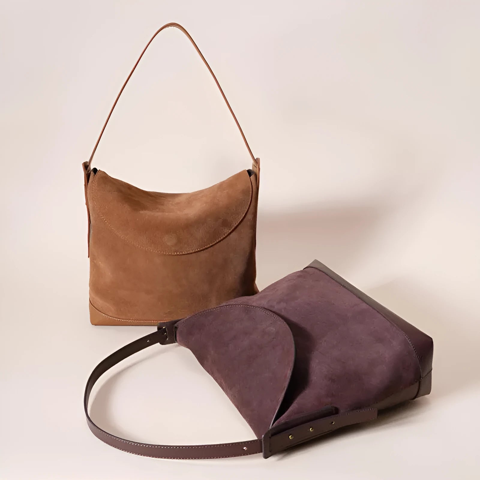 Light brown genuine leather retro style women's shoulder bag with clamshell opening.