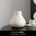 Ceramic round belly vase with black or white coloured glaze finish and modern simplicity design