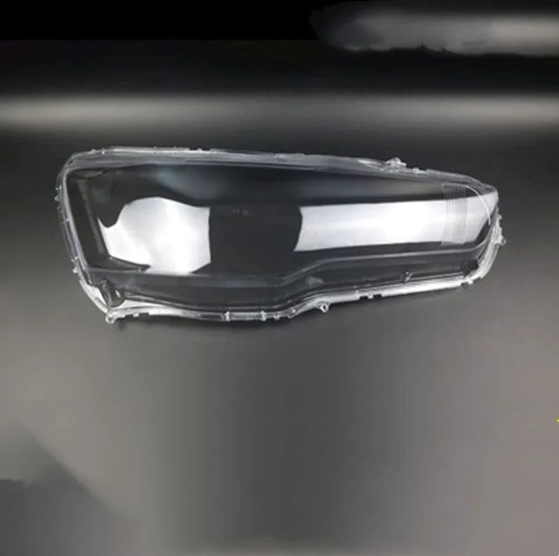 Transparent plastic car headlight housing cover showing 50mm by 30mm dimensions