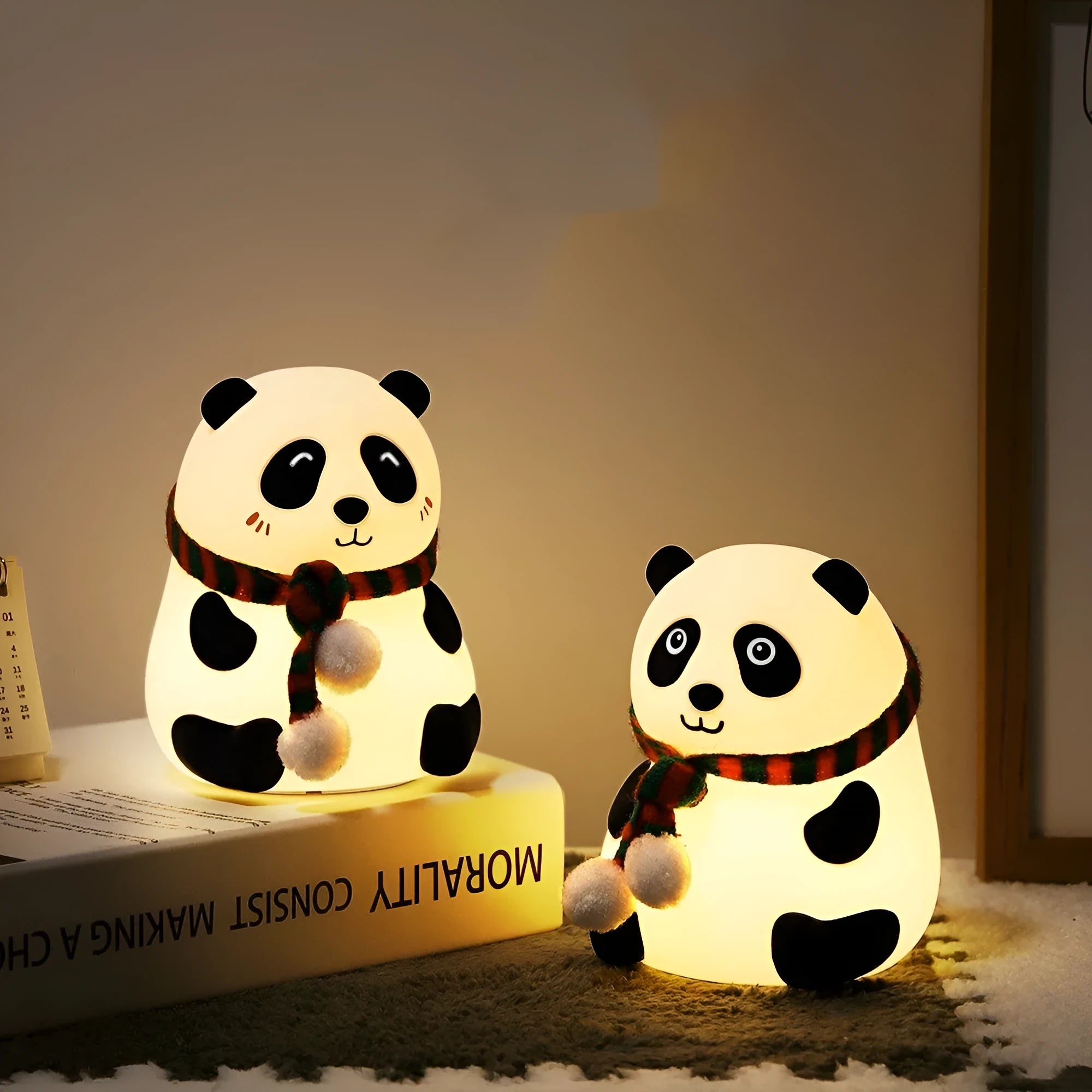 Panda-shaped silicone and ABS night light with soft glow, shown with USB charging cable.