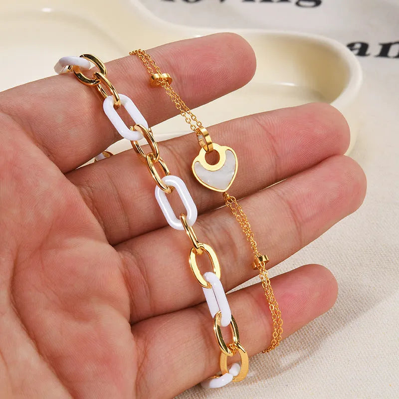 Stainless steel resin bracelet with double layer heart design for women