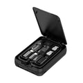 Black budi multi-functional power bank with cables and SIM kit on a table