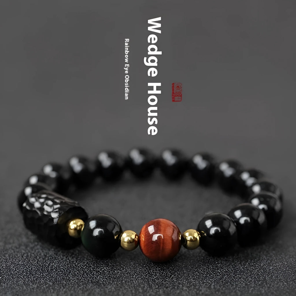 Handcrafted obsidian bracelet with 10mm yellow tiger eye beads on elastic cord