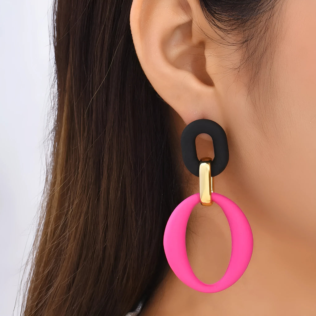 Geometric exaggerated hoop earrings in acrylic and alloy with a retro, personality-driven design