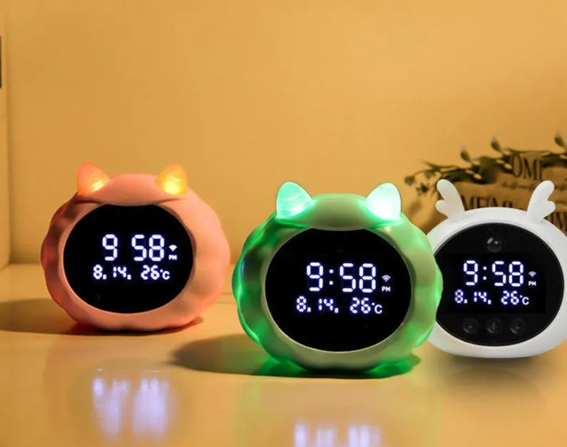 Smart alarm clock with voice control, motion sensor, and luminous display in silicone construction