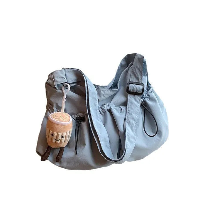 Ultra-light pleated crossbody student cloth bag in polyester with split pocket design