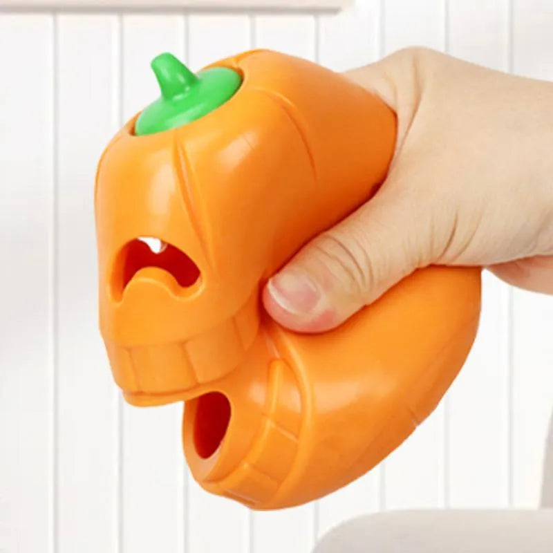 Yellow pumpkin-shaped TPR dog chew toy for aggressive chewers