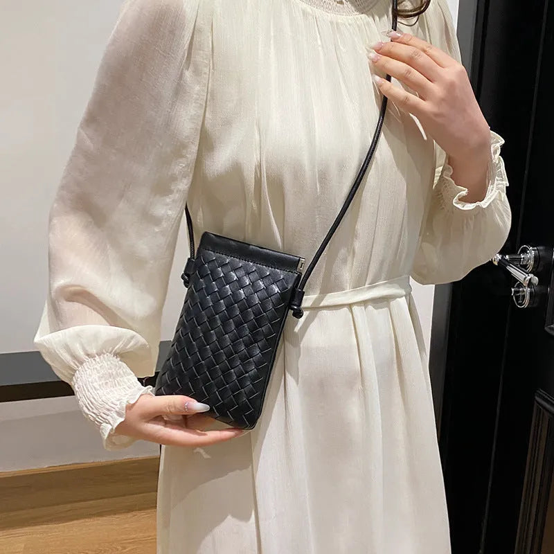 Vertical square PU crossbody bag with vintage weave texture in multiple colour options showing phone compartment.