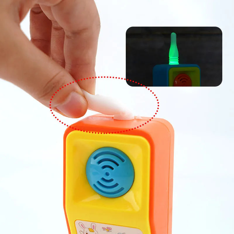 Children's educational toy with sound, light and music features showing cartoon animal design