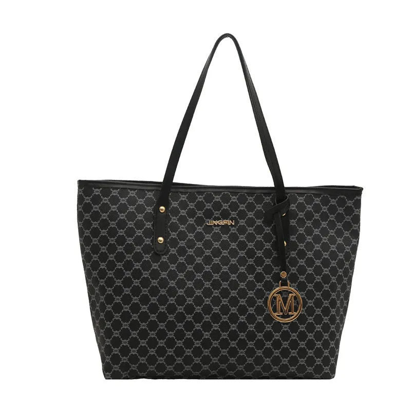 Western style textured PU shoulder bag in black, shown with contrast stitching and an adjustable strap.