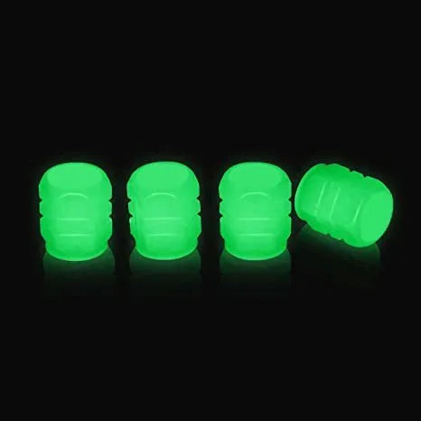 Pack of luminous rubber tyre valve caps in assorted colours including light blue and green.