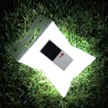 White inflatable solar light with LED lamp for camping and emergency outdoor use, deflated size 310x203x10mm
