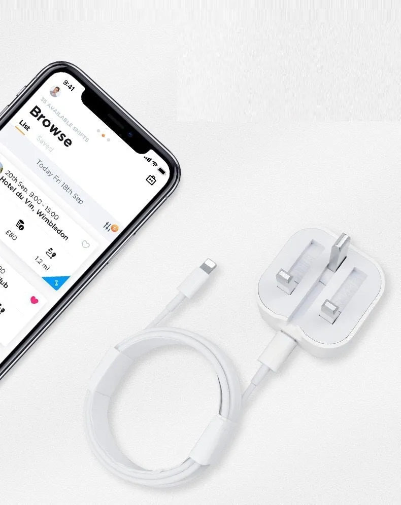 White 20W USB-C UK wall charger with a fixed three-pin plug and a USB-C cable.