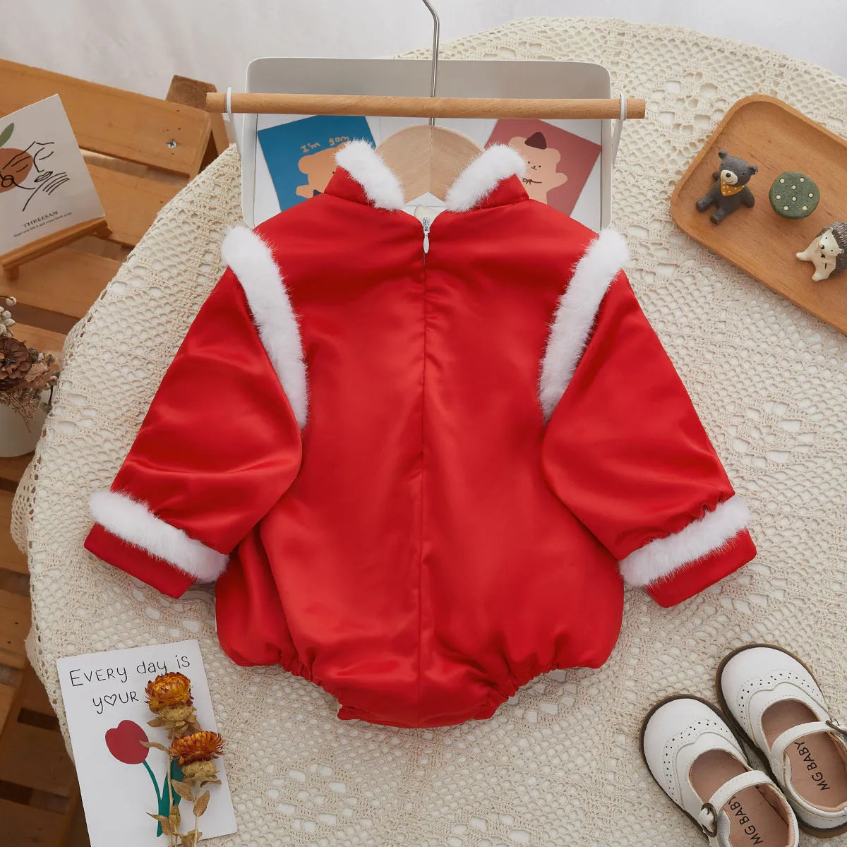 Red triangle baby jumpsuit for girls with long sleeves from 66cm to 90cm height