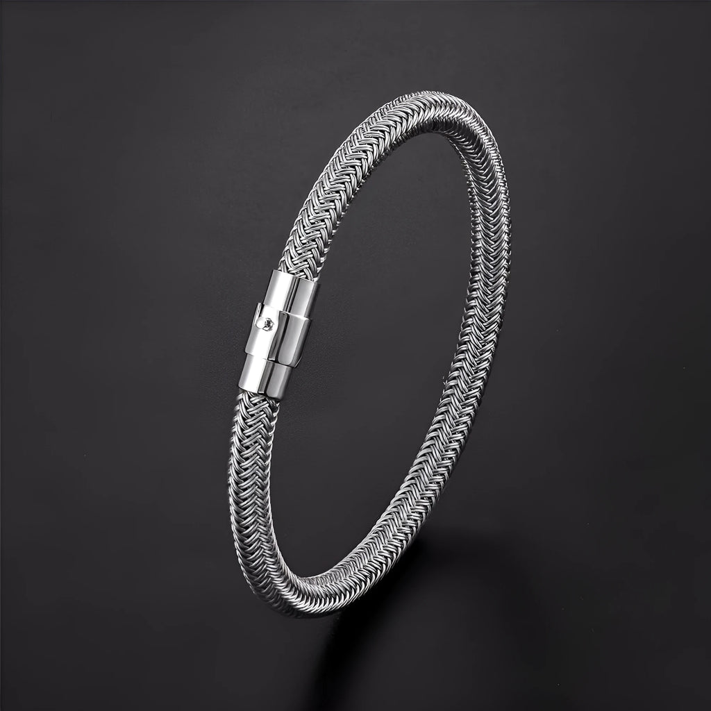 Titanium steel geometric wire bracelet with a magnet clasp shown in one of four colour options.