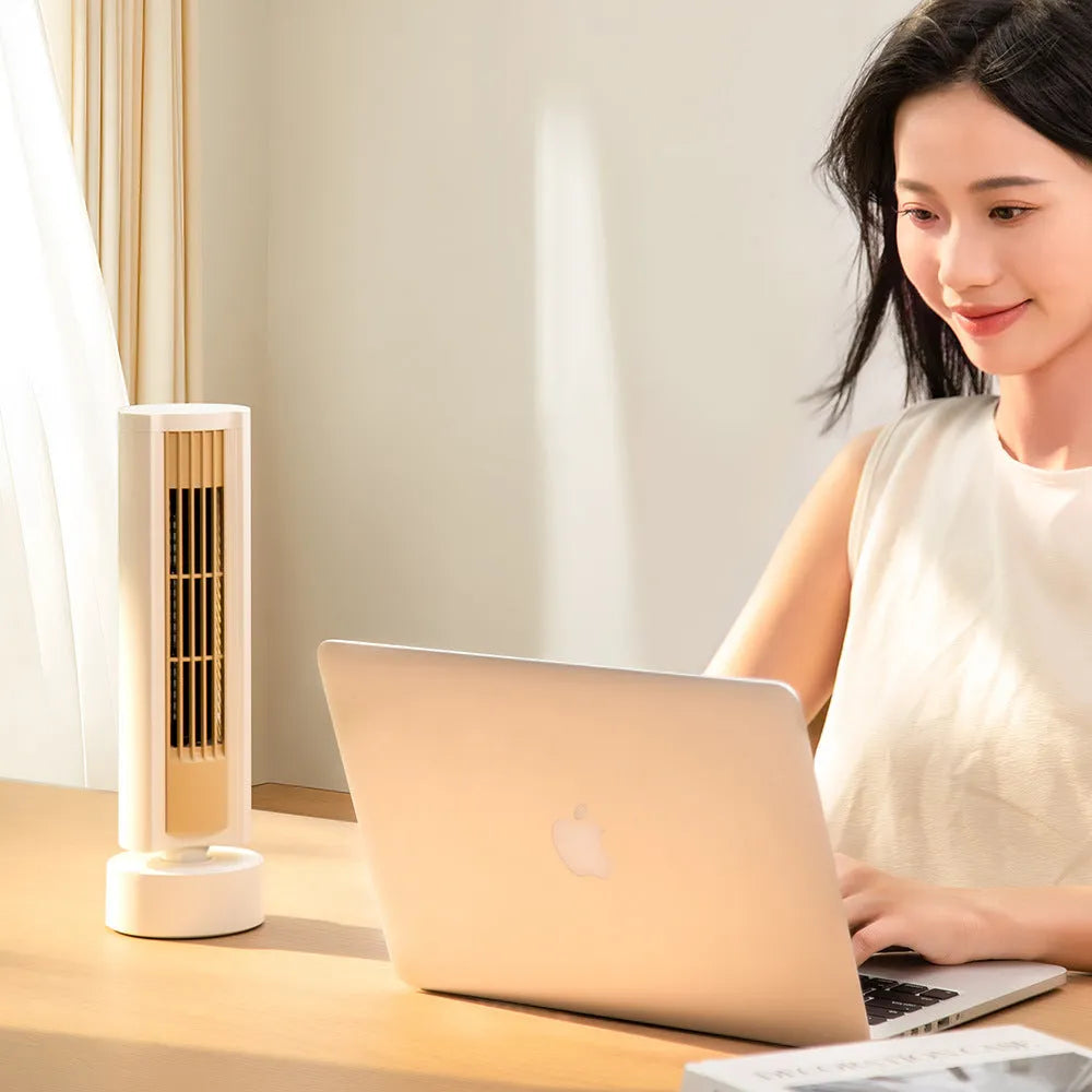Milky white leafless desktop fan with brushless motor, auto-shake head, and USB power on a desk