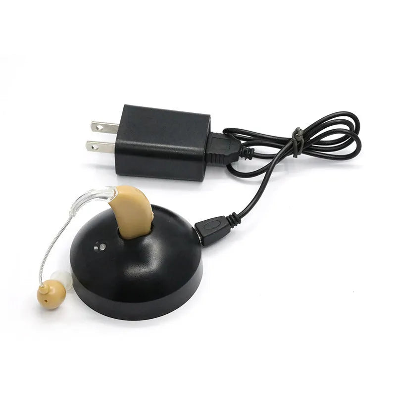 Black rechargeable hearing aid amplifier with silicone ear tips for elderly hearing support