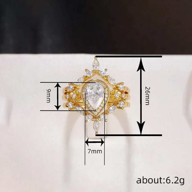 Women's light luxury drop-shaped zircon ring in T0541 yellow gold finish, copper base, geometric water droplet design