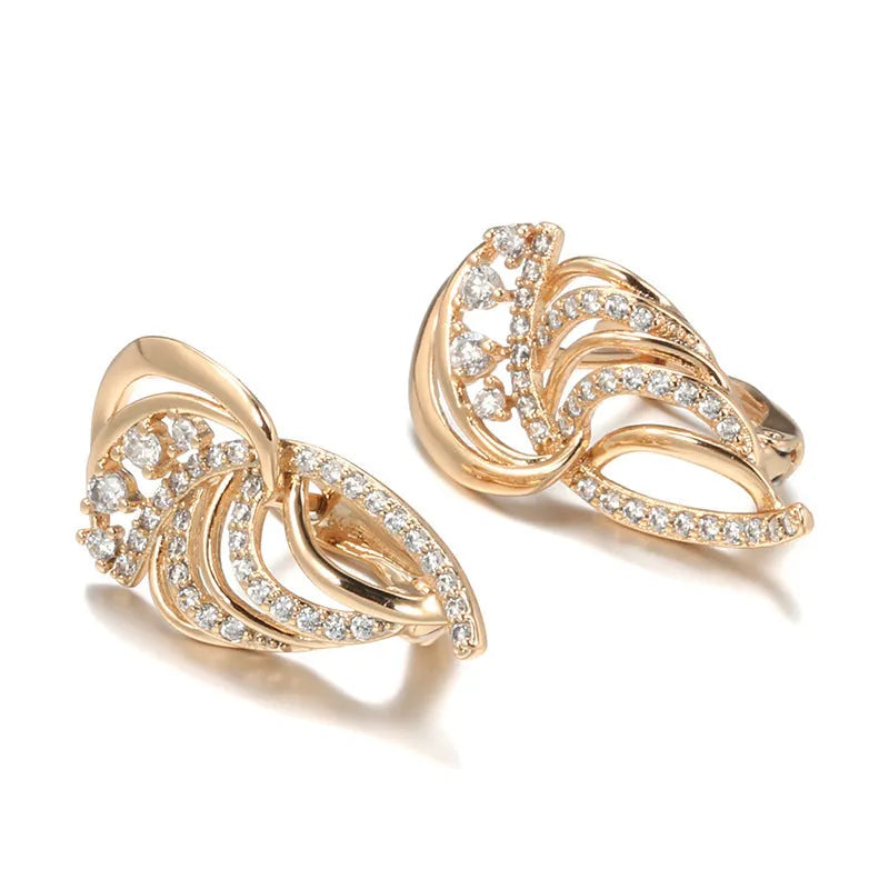Gold geometric wing ear clips with micro-inlaid zircon stones on U-shaped copper clips