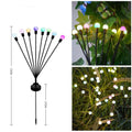 Set of solar-powered LED garden lights with ground spikes, showing firefly-style heads and solar panel.