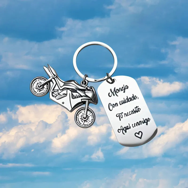 Stainless steel motorcycle keychain with velvet cloth on flannel background