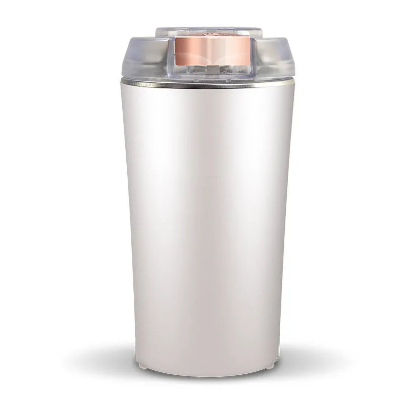 Blue mini flour mill and grinder machine with adjustable settings for making spice and grain powders.