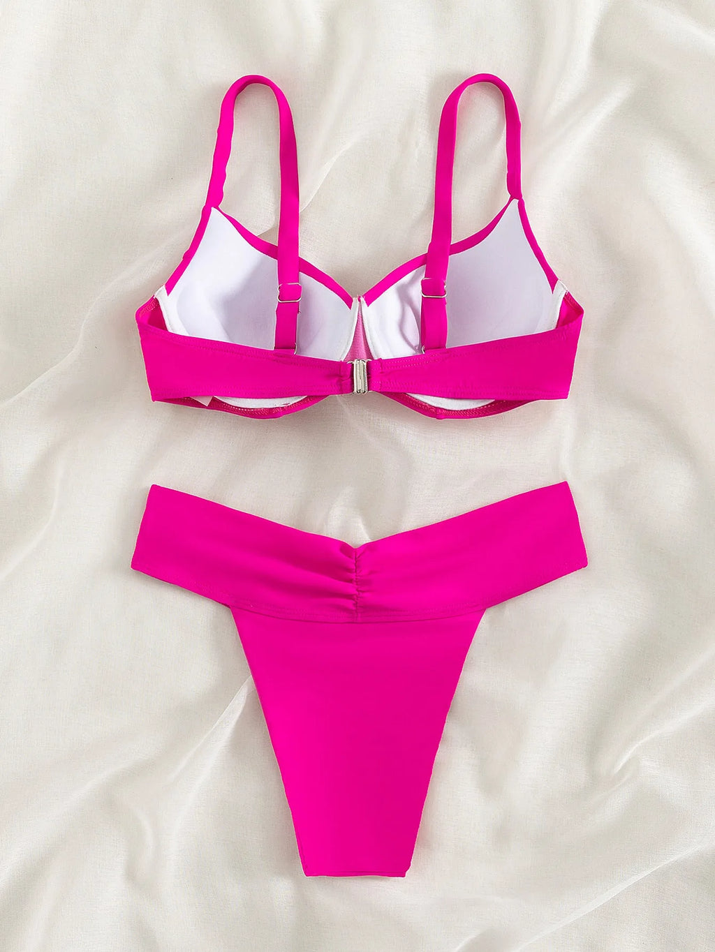 Solid colour nylon bikini swimsuit with briefs style and sleeveless top on a mannequin