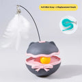 Electric self-righting cat tumbler toy in lemon yellow, sky blue, and soft fog grey colours.