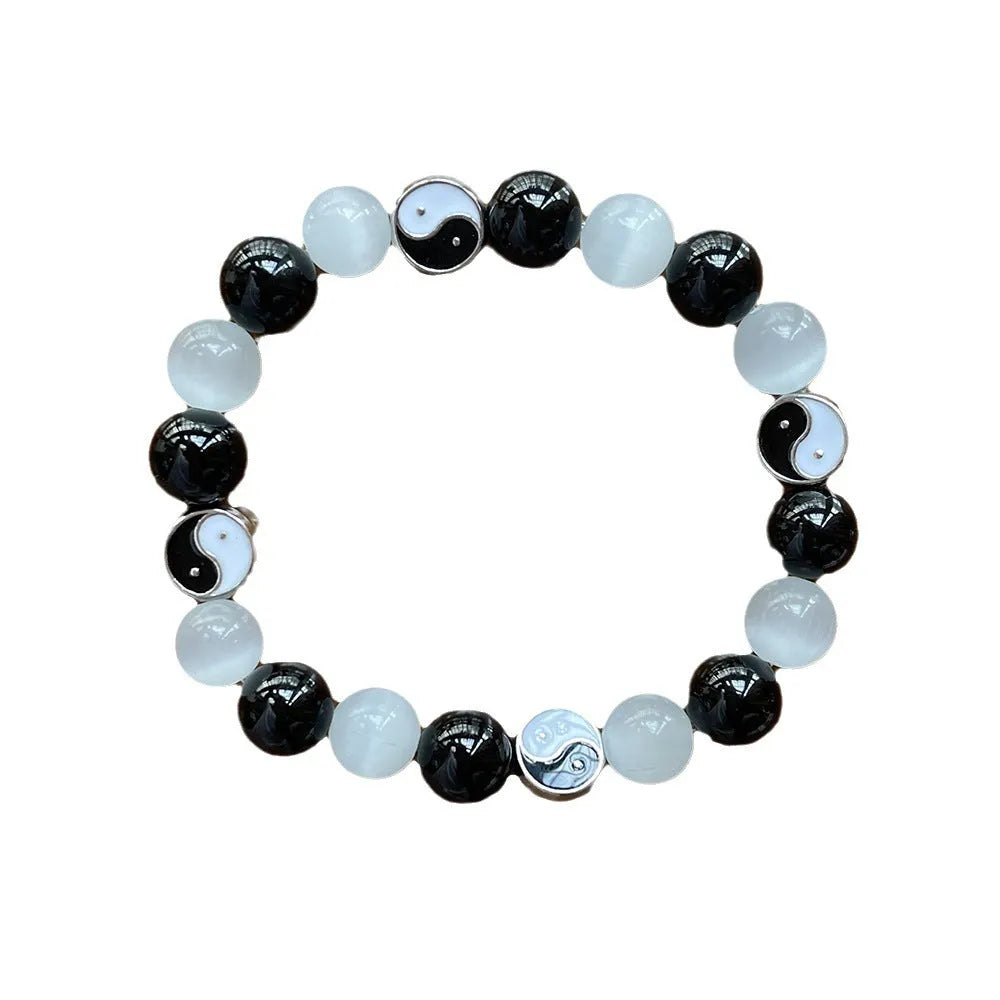 Natural opal agate Chinese Tai Chi beaded bracelet with 10mm polished stone beads and black agate details