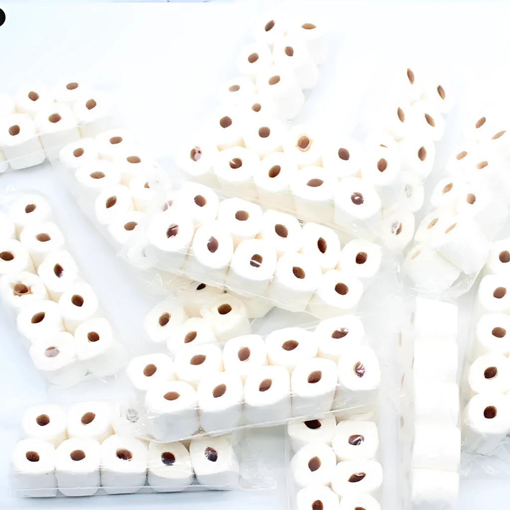 Miniature paper tissue roll model measuring 30mm wide by 15mm deep by 80mm high